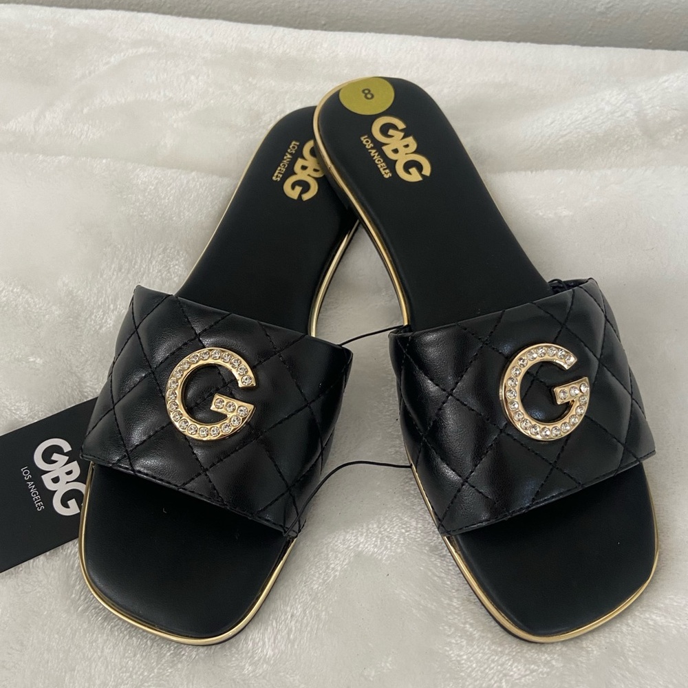 Guess black flat sandals. Size 8